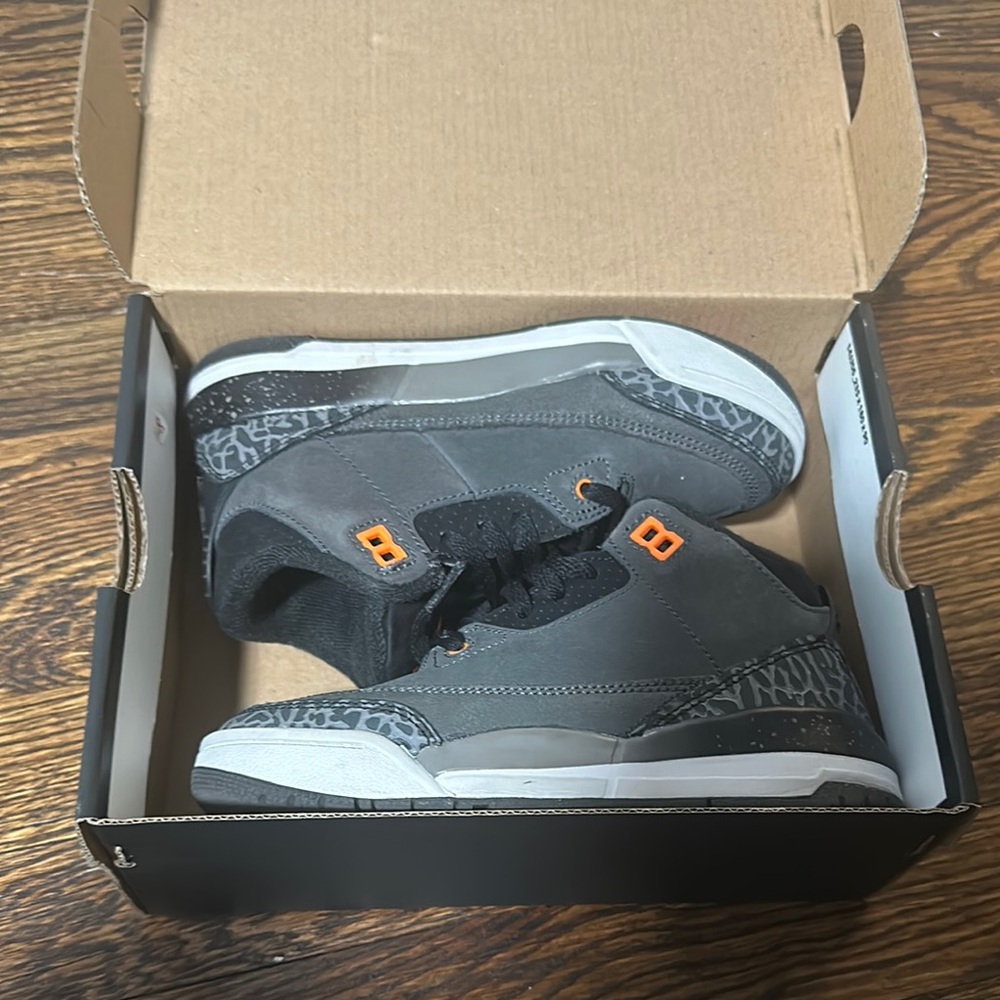 Gray and Black Jordan 3s kids Sneakers with Orange Accents